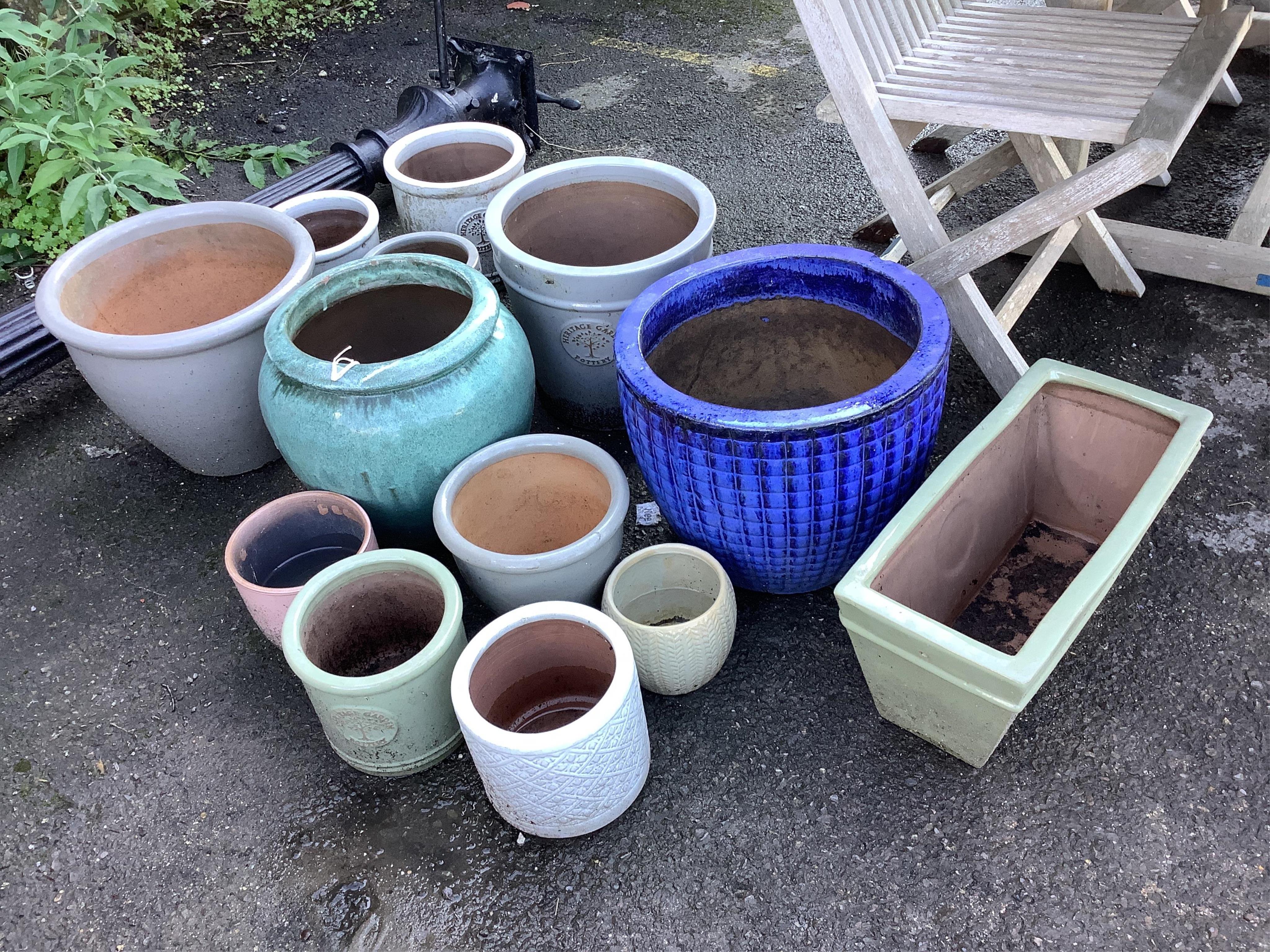 A collection of assorted glazed pottery garden planters including Heritage Garden Pottery, largest diameter 39cm, height 32cm (14). Condition - fair to good